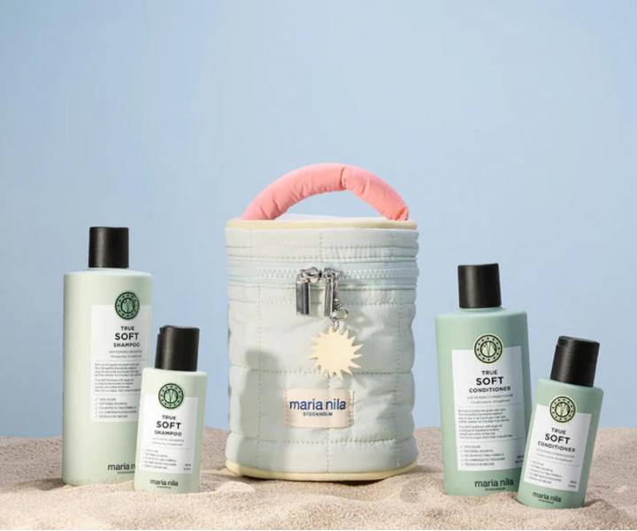Dar�ekov� sada pre such� vlasy Maria Nila True Soft Beauty Bag + kozmetick� ta�ka zdarma