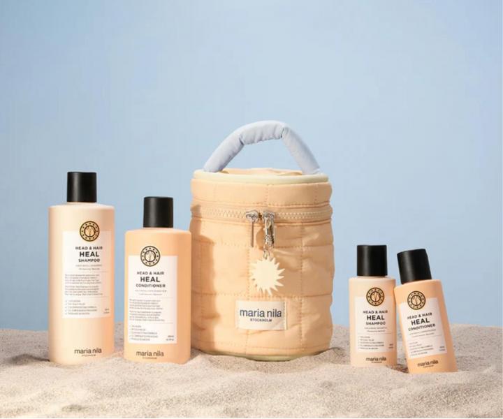 Dar�ekov� sada pre zdrav� vlasov� poko�ku Maria Nila Head & Hair Heal Beauty Bag + kozmetick� ta�ka zdarma